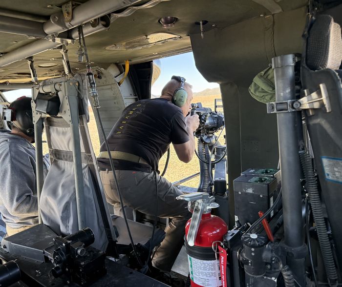 Operator firing from Black Hawk doorway