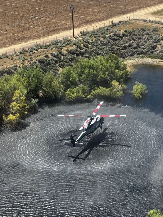Aerial view — Firehawk hover water snorkel operations