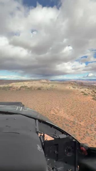 Cockpit view over desert terrain, Moab UT